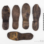 Soles of wooden camp clogs. Condition before conservation. Photo Rewards