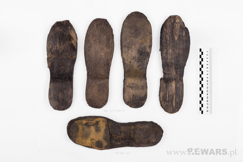 Soles of wooden camp clogs. Condition before conservation. Photo Rewards