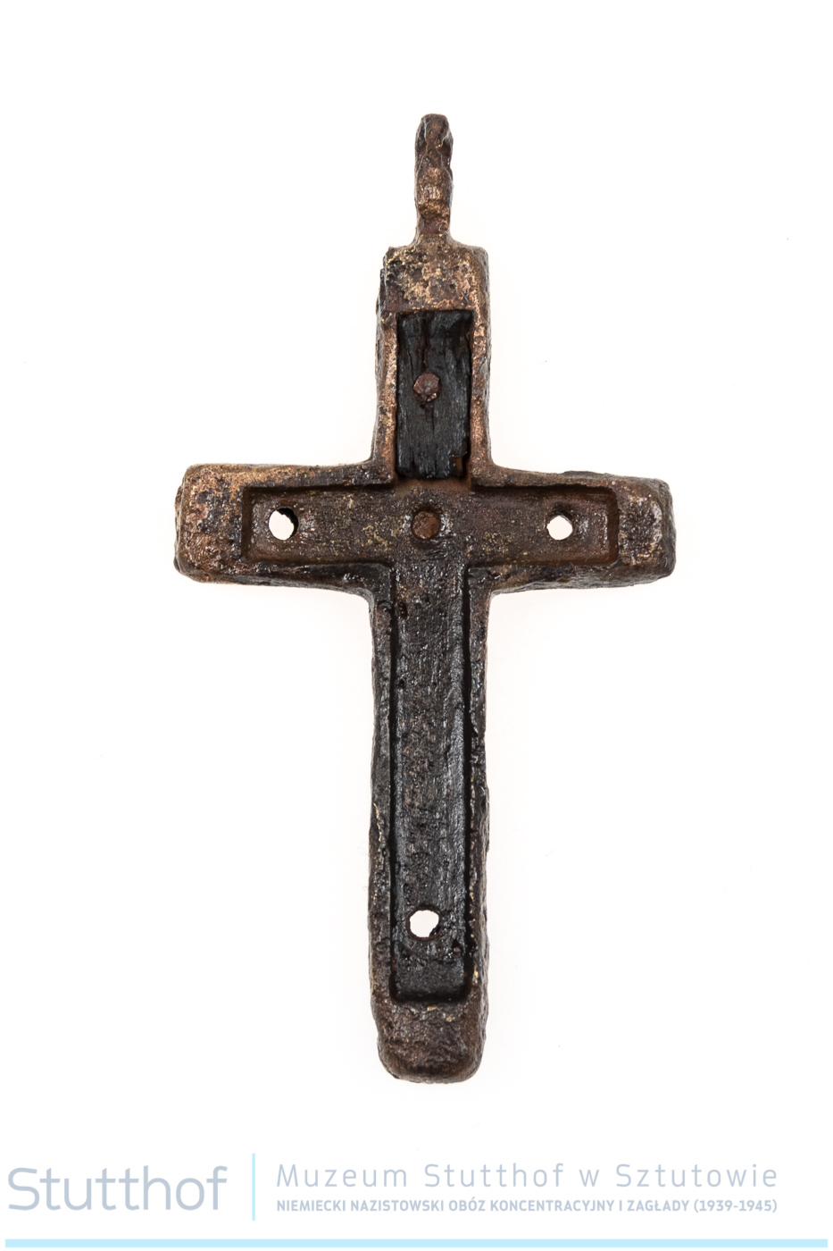 A metal cross illegally made in the camp. Condition after conservation.