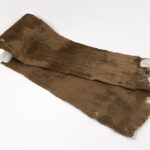 A scarf belonging to one of the execution victims. Condition after conservation.