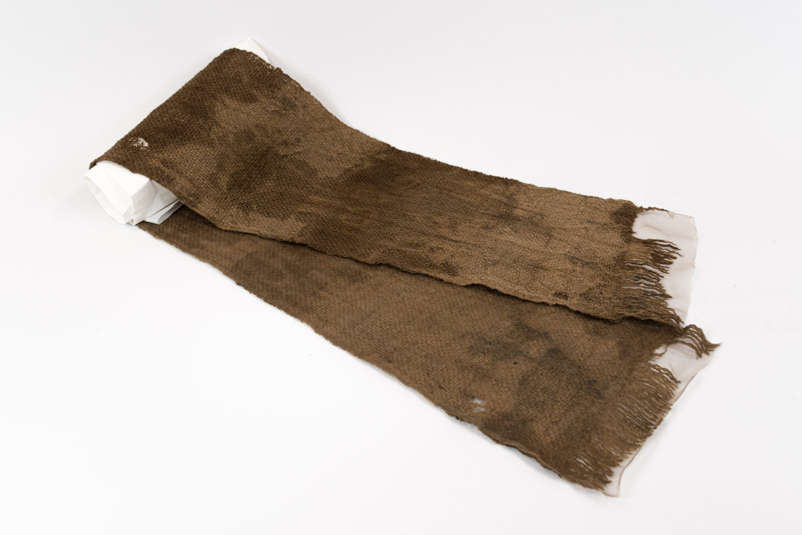 A scarf belonging to one of the execution victims. Condition after conservation.