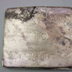 Cigarette case, property confiscated from prisoners. Condition after conservation.